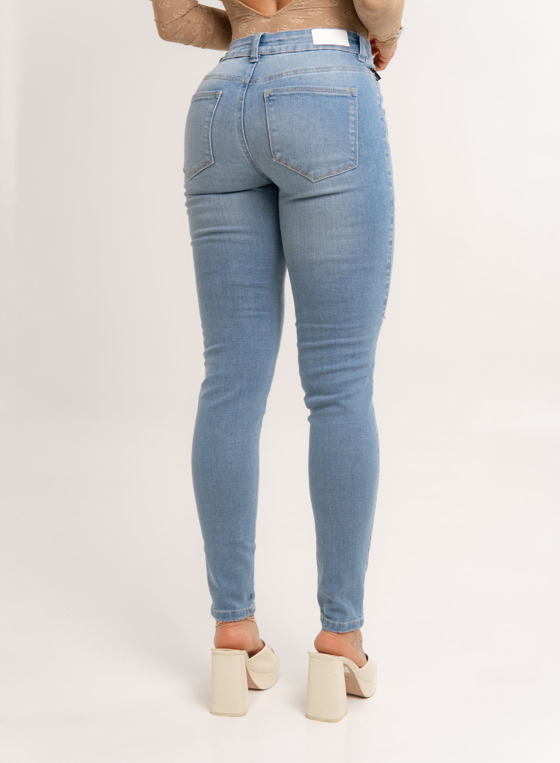 Women's Mid Rise Ripped Skinny Jeans