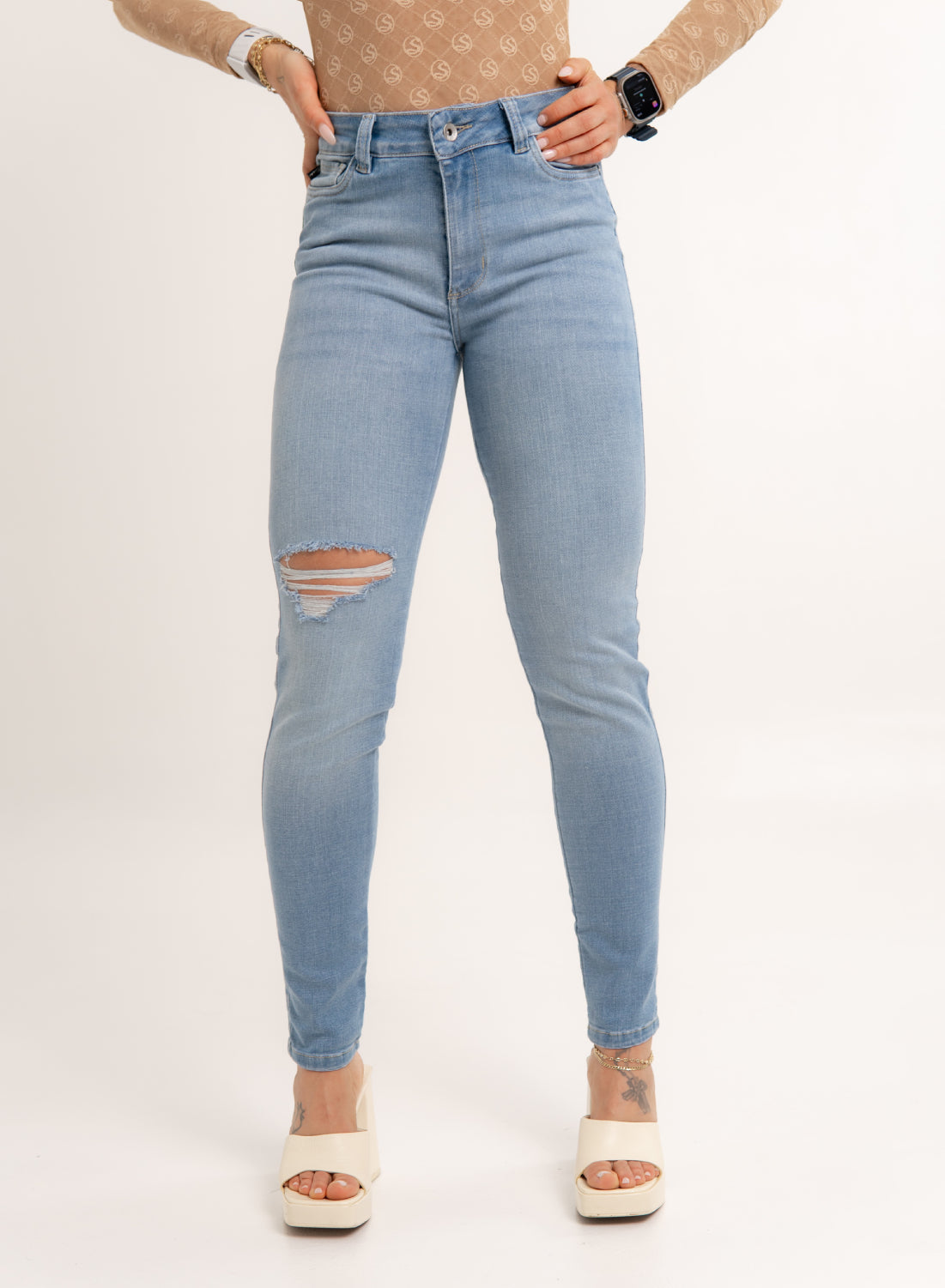 Women's Mid Rise Ripped Skinny Jeans