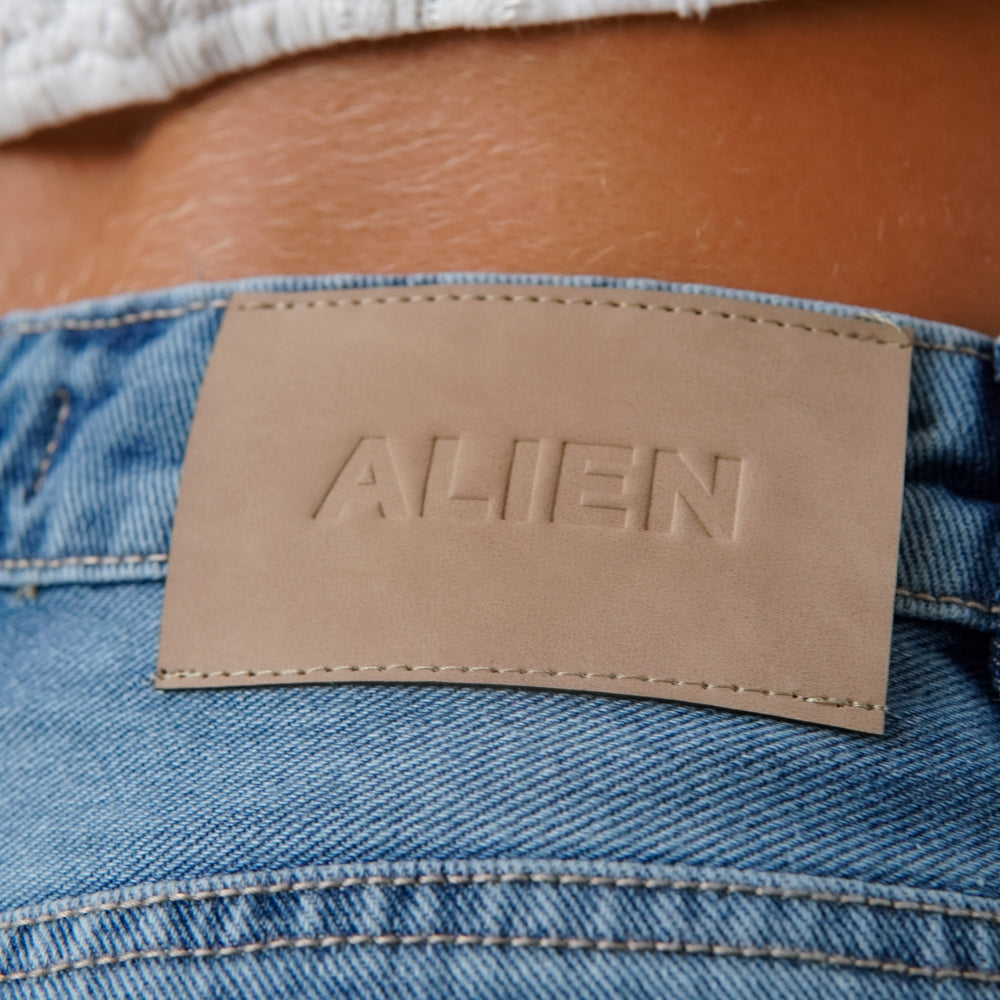 
                      
                        WIDE LEG RIPPED BLUE ALIEN JEANS
                      
                    