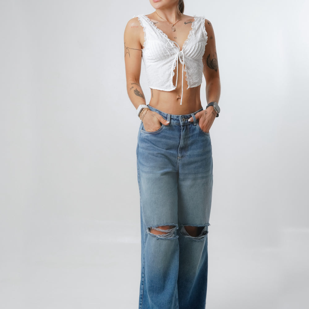 
                      
                        WIDE LEG RIPPED BLUE JEANS
                      
                    