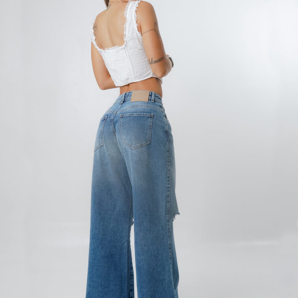 
                      
                        WIDE LEG RIPPED BLUE JEANS
                      
                    