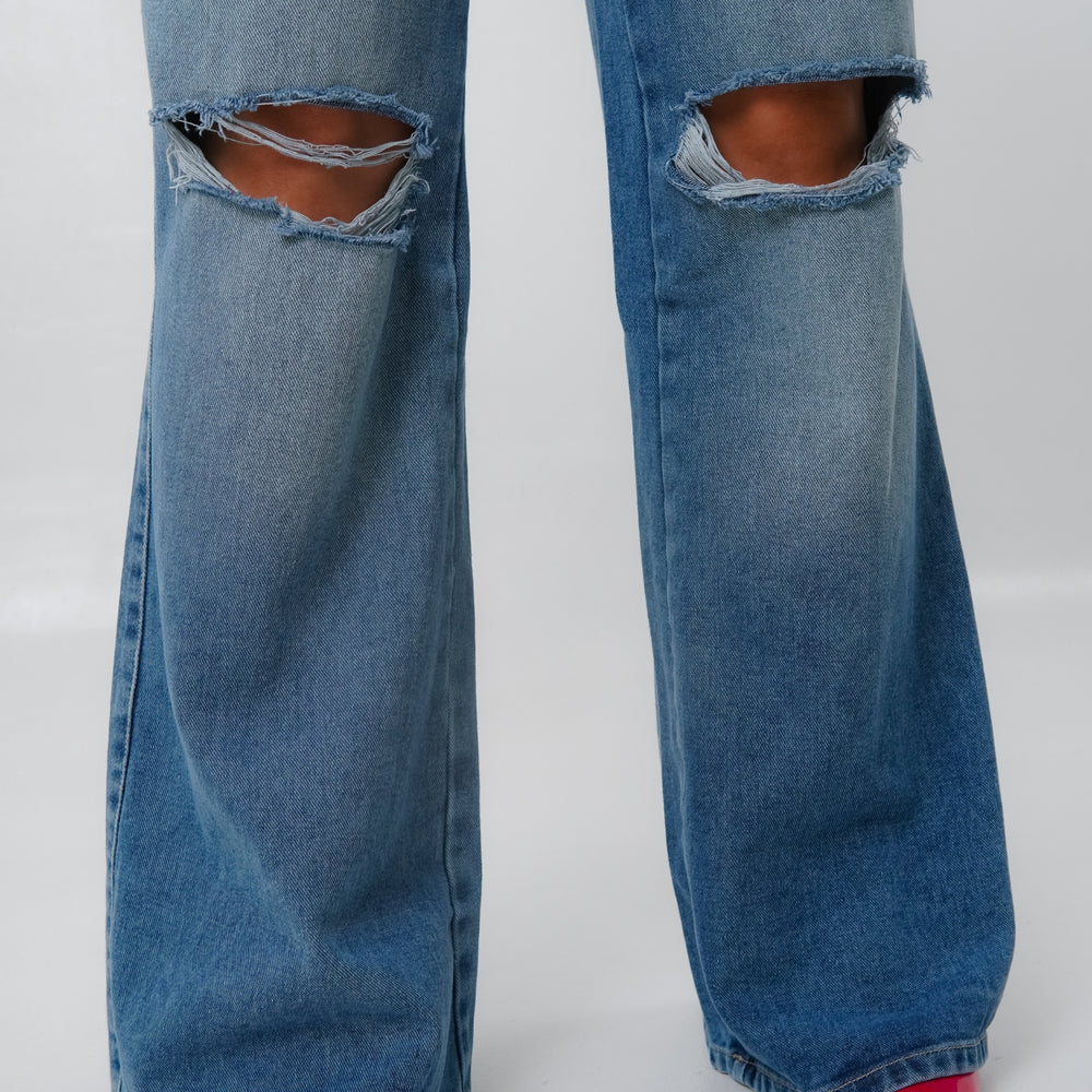 
                      
                        WIDE LEG RIPPED BLUE JEANS
                      
                    