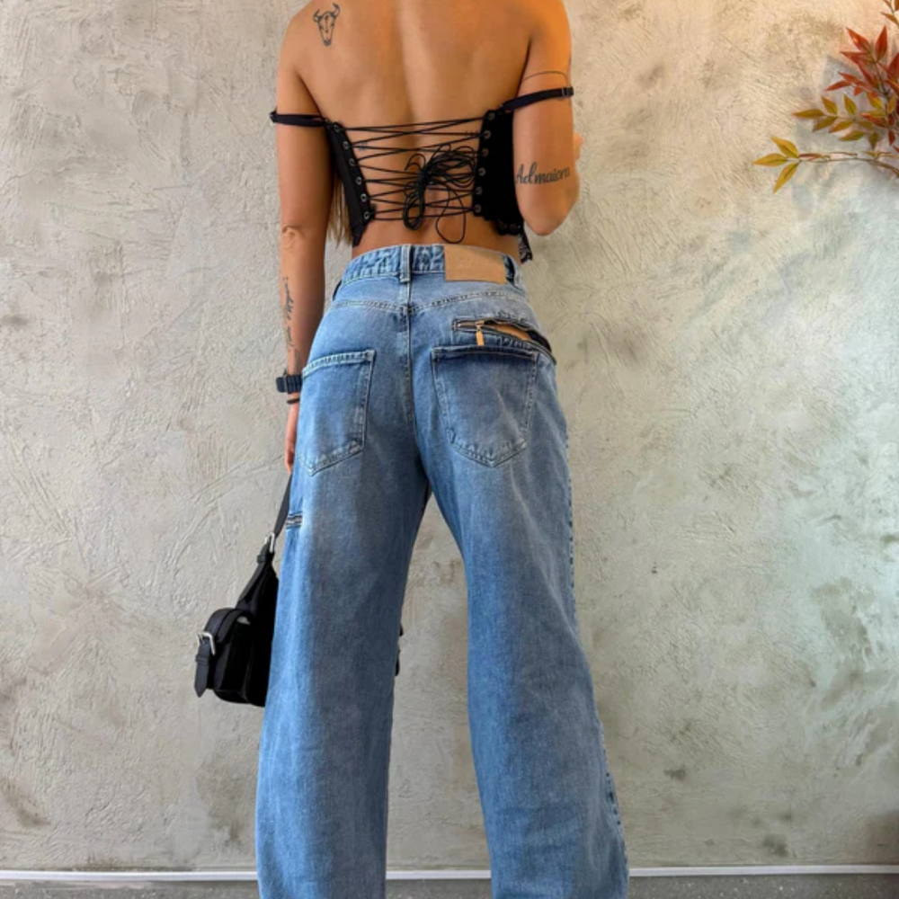 baggy blue mid rise alien jeans