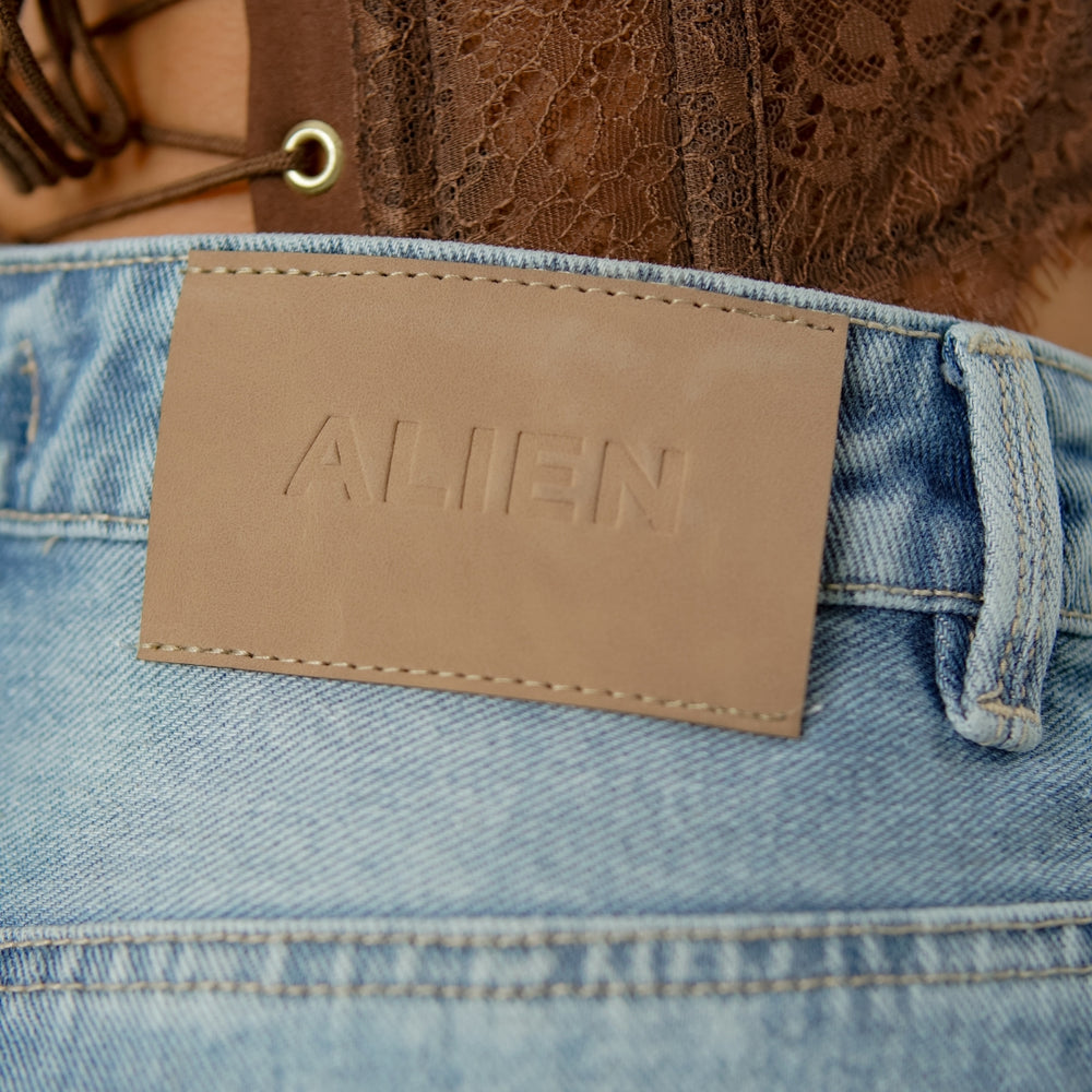 
                      
                        light blue flare alien jeans
                      
                    